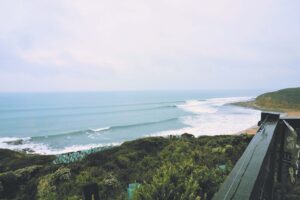 Picturesque waves and surfers seen from the observatory